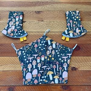 The Suckling Duckling Happy Baby Revolution Suck Pads and Drool Cover Mushrooms